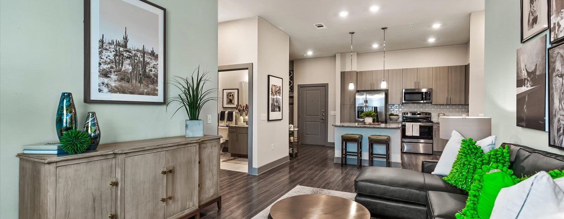 open living concept showing living room and kitchen combined with ample space for seating and modern living room decor
